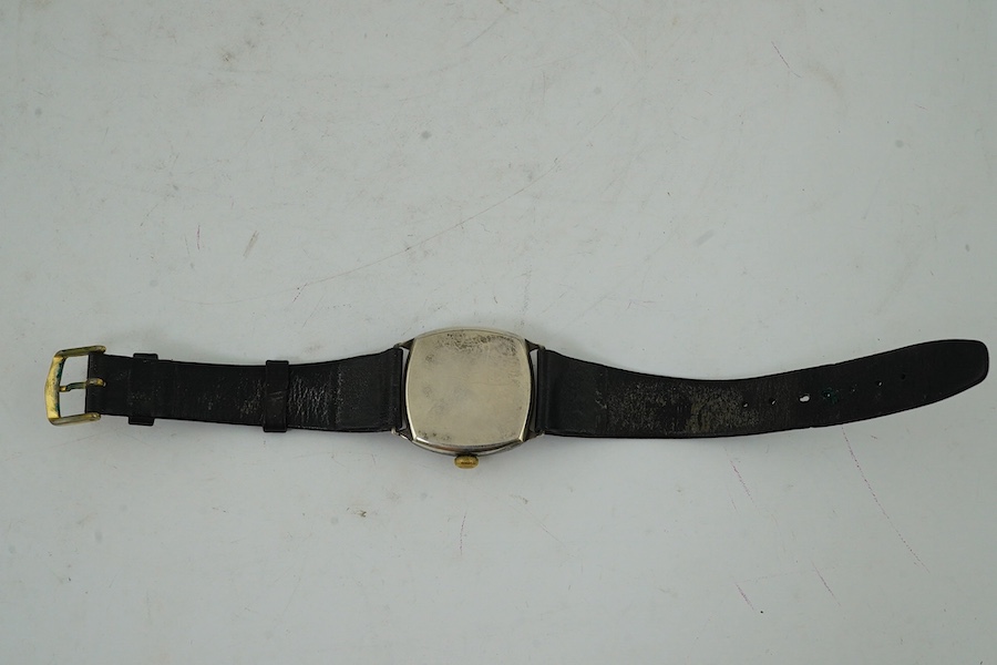 A George V silver military? manual wind wrist watch, case import marked for London, 1915, and a silver J.W. Benson manual wind wrist watch. Condition - poor to fair